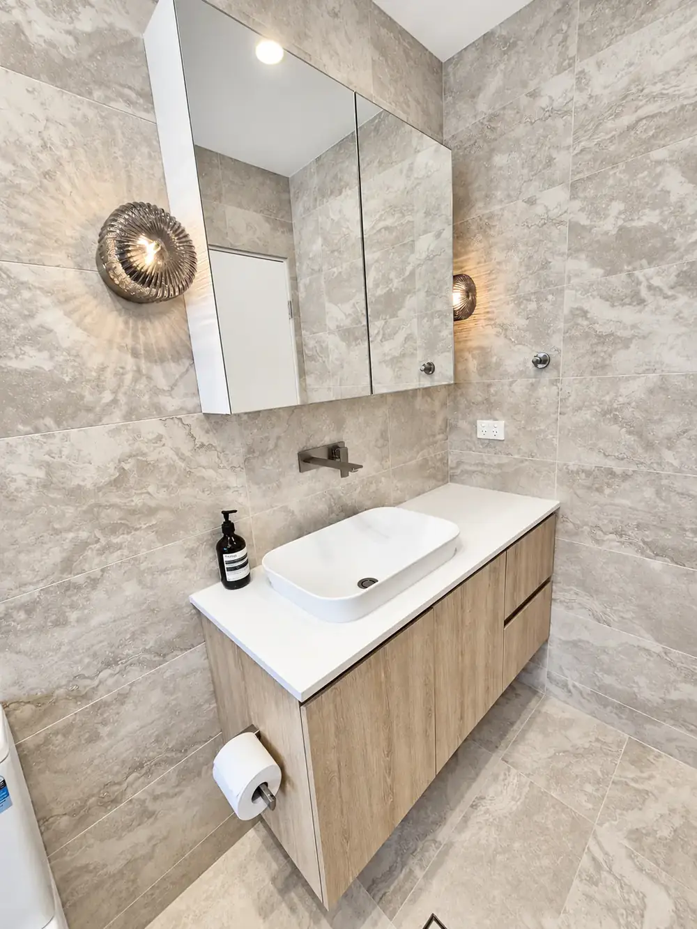 Jannali ensuite vanity with mirrored shaving cabinet and wall lights